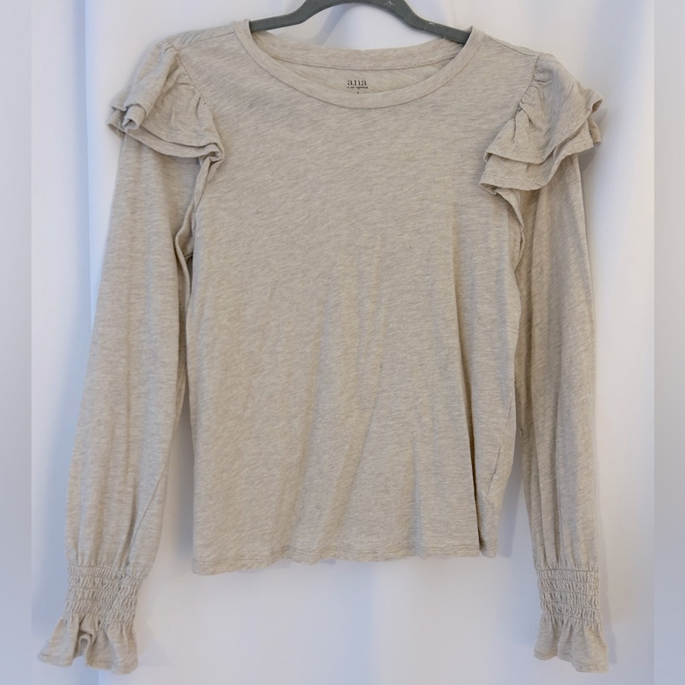 Ruffle shoulder and wrist top.   EUC!